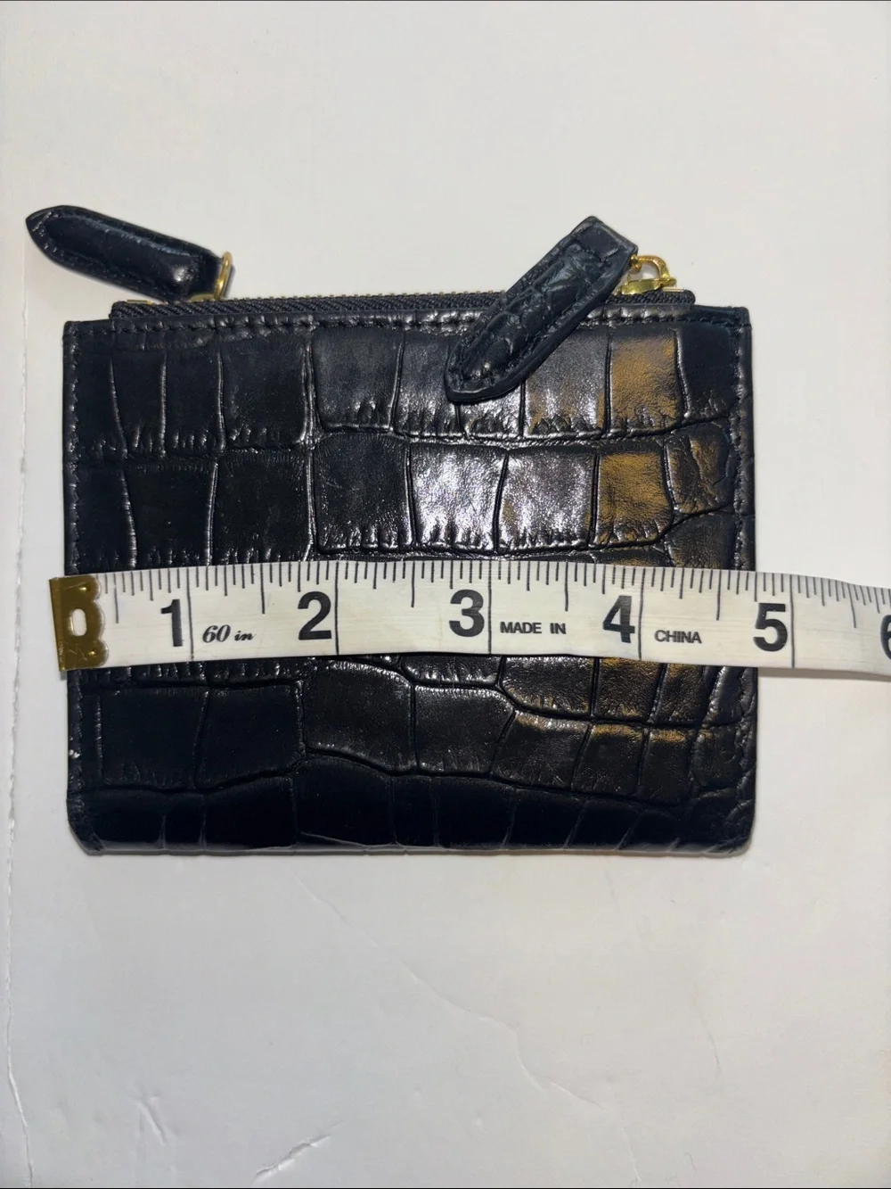 KURT GEIGER BLACK EMBOSSED LEATHER WALLET SNAP CLOSURE 2 GOLD TONED ZIP POCKETS